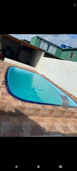 Casa na praia com piscina ar condicionado